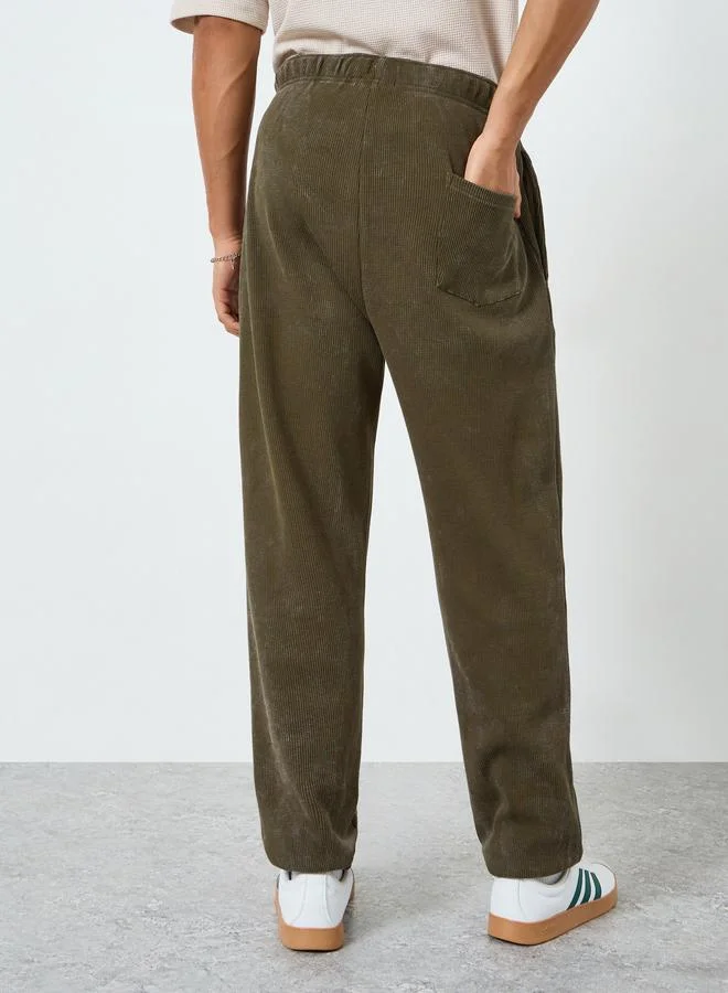 Styli Men Olive Graphic Print Relaxed Fit Joggers